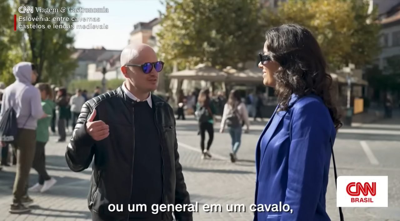 Tine Aćimović guiding CNN Brasil host Daniela Filomeno through Slovenia